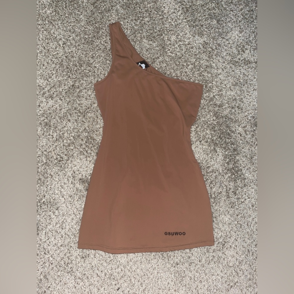 Brand new with tags GSUWOO nude mini dress size medium.